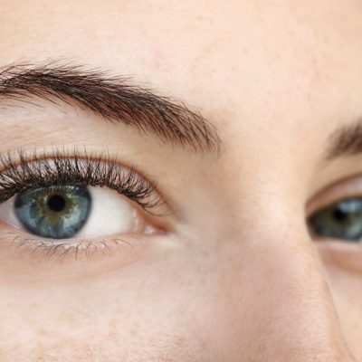 Young woman with eyelash extensions, closeup